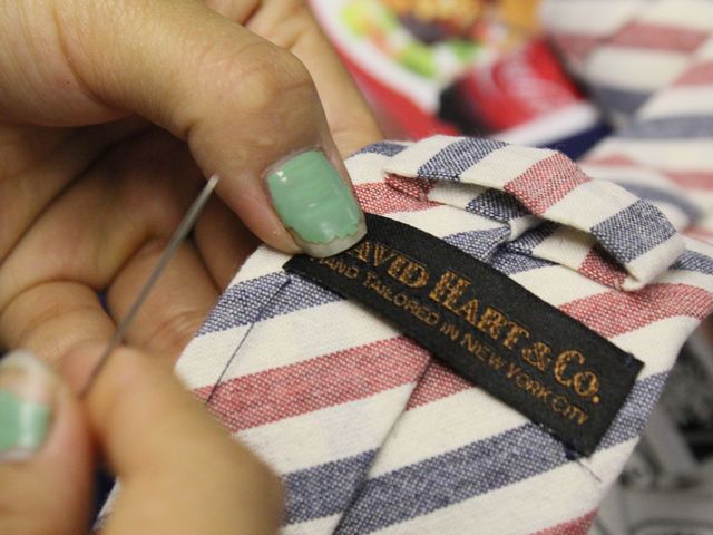 <p>Ties, handmade for David Hart's fashion collection, go through a ten-step process of cutting, stitching and pressing.</p>
