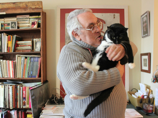 <p>Mario Romero calls his cat, Alejandro, his "baby."</p>
