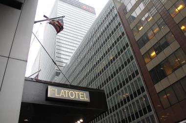 The investment duo slated to buy the Sony building in Midtown for $1.1 billion purchased a shuttered luxury hotel in Midtown earlier this month, a 46-story property they reportedly plan to convert to high-end condos.
Investors Joseph Chetrit and David Bistricer bought the Flatotel, on West 52nd Street near Seventh Avenue, for about $180 million in early February, according to a report by Crain’s. The hotel, which housed 289 rooms and Moda Restaurant, was foreclosed upon by three investment groups after the building’s owner, the Alexico Group, defaulted on debts against the property.