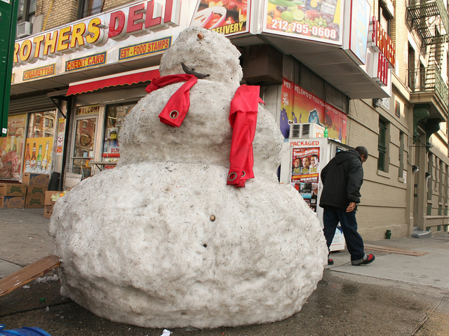 <p>A giant snowman still stands on a Washington Heights street corner despite warmer weather.</p>

