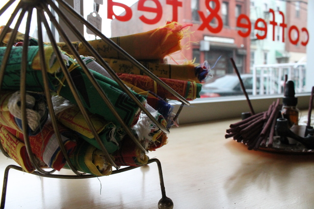 <p>Prayer flags and incense adorn the inside of Goodies, an extension of Good Yoga in Bed-Stuy that will sell juice, kombucha, coffee and tea.</p>
