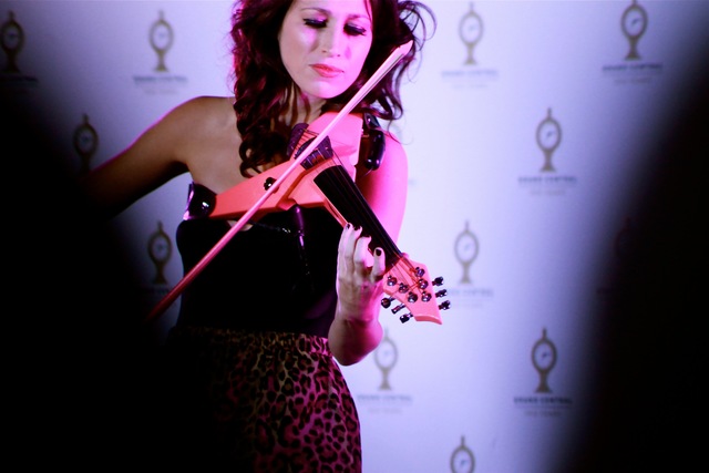 <p>International performer and electric violinist Sarah Charness<em> </em>performed in the opening ceremony of the Grand Central Centennial.</p>
