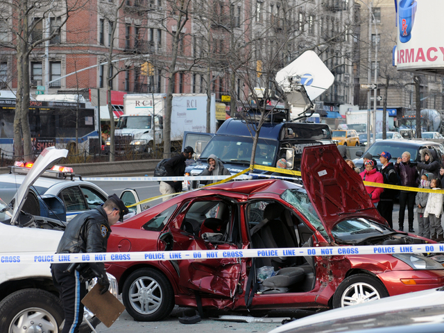 <p>Firefighters used the "jaws of life" to remove the passengers in the Ford Focus, Feb. 6, 2013.</p>
