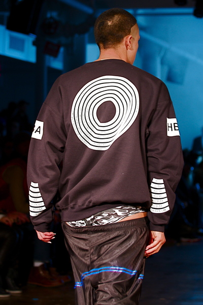 <p>Back graphic details on a look worn by Boychild</p>
