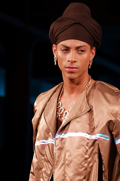 <p>Bronze shiny nylon jacket and eye catching brown turban</p>
