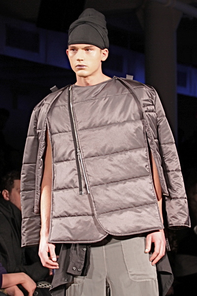 <p>Transformative bronze puffer jacket and cargo pants and black shirt waist tie</p>
