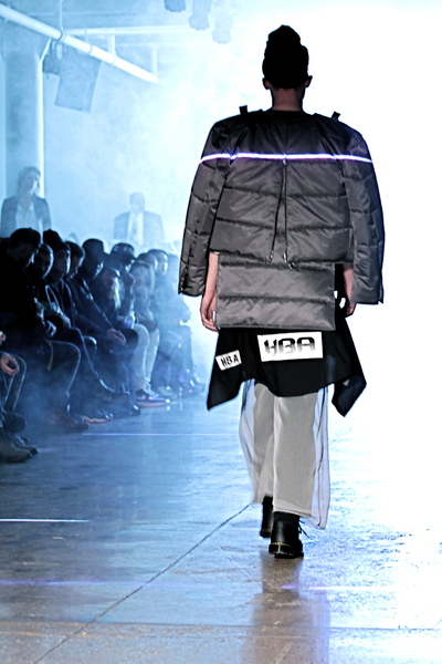 <p>Rear zipper back, shirting and sheer overlay track-pants</p>
