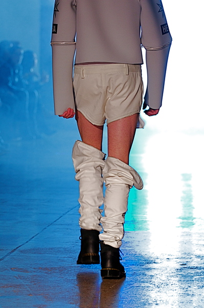 <p>Shorts transformed into leg warmers worn with a transformative jacket</p>
