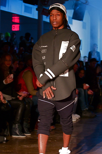 <p>A$AP Rocky closes the show in a neoprene jacket look</p>
