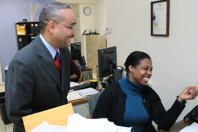 <p>State Sen. Jose Peralta&nbsp;laughs with a staffer in his East Elmhurst district office.</p>
