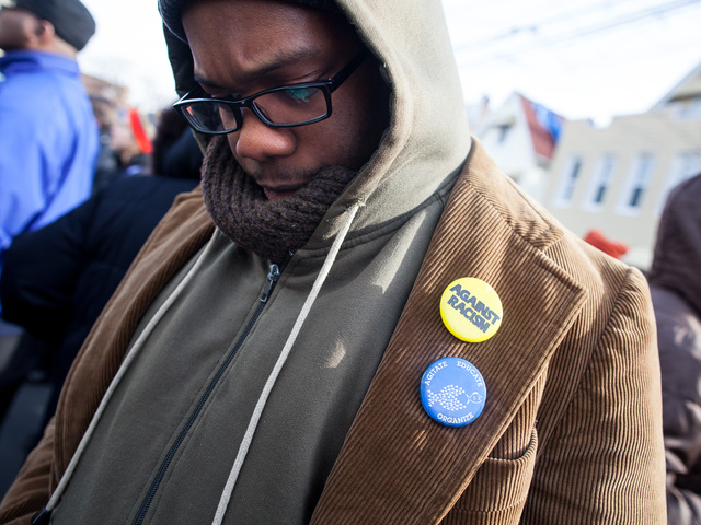<p>A man attends the one-year anniversary of Ramarley Graham - the teenager who was gunned down by an NYPD officer - in the Bronx on Feb. 2, 2013.</p>
