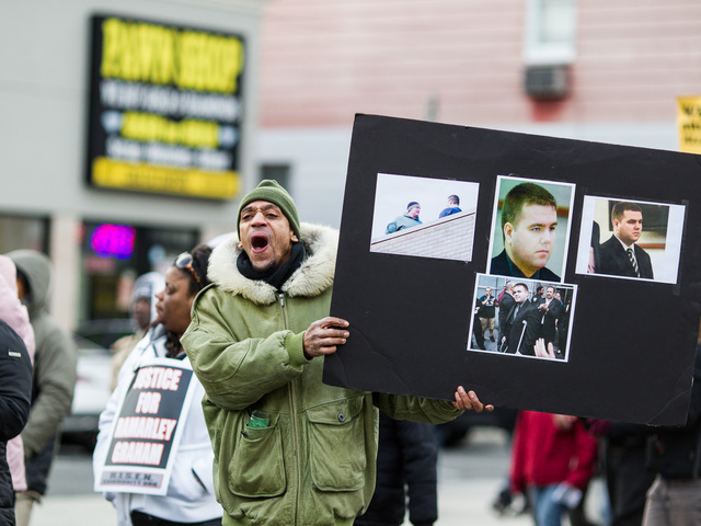 <p>A man shouts in protest during the one-year anniversary rally and vigil for Ramarley Graham in the Bronx on Feb. 2, 2013.</p>

