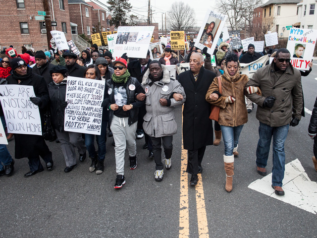 <p>Marchers at the one-year anniversary rally for Remarley Graham locked their arms in solidarity as they approached the 47th NYPD Precinct in the Bronx on Feb. 2, 2013.</p>
