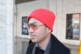 <p>Mark Pagaduan, a photographer for Lacoste, wears a beanie from the fashion house he works for.</p>
