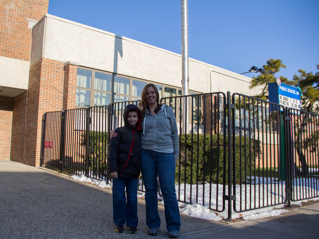 <p>Mary Celi dropping her son, Francis Celi, 10, at P.S. 69. Francis is in the 8:1:1 program in the school for autistic children, and his mother fears the DOE made the wrong choice to put the program in I.S. 72 and will set her son back, Feb. 13, 2013.</p>
