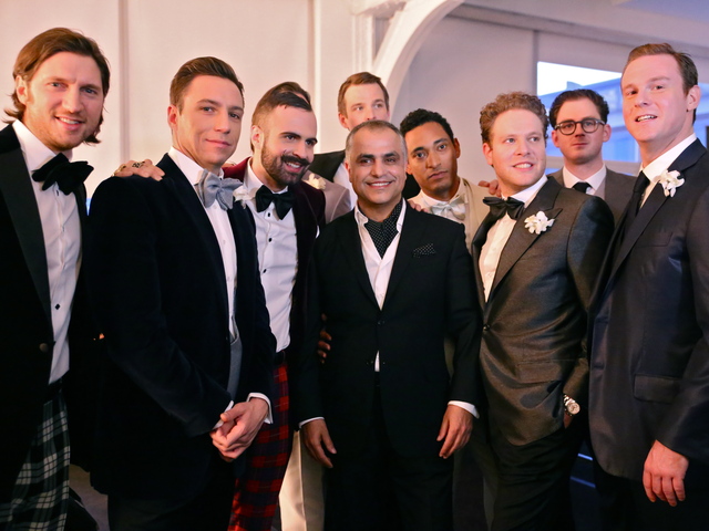 <p>Designer Michael Fenici with his "real men" models. "We chose business men because they are real," Fenici said. "This is who I actually design for."</p>
