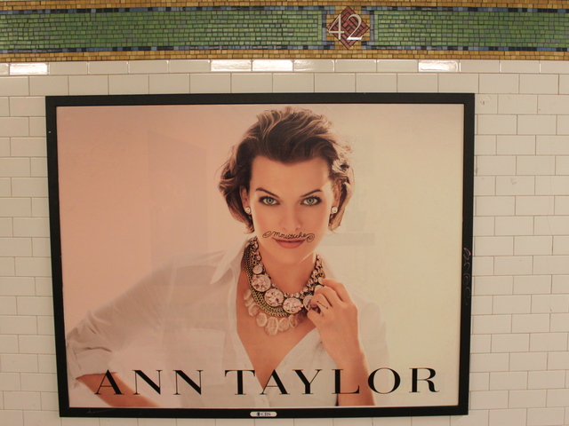 <p>Patrick Waldo tags advertising posters with "moustache" scrawled across a model's upper lip.</p>
