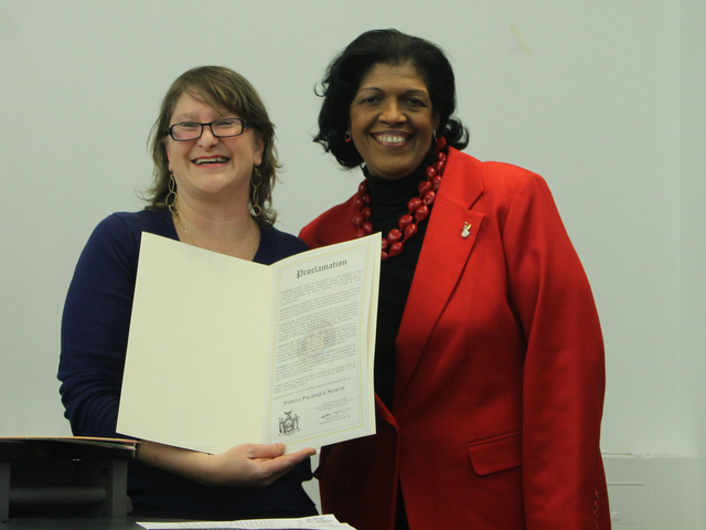 <p>Elizabeth Lorris Ritter, a representative of State Senator Adriano&nbsp;Espaillat, posed for a photo with Pamela Palanque-North after Palanque-North was honored with a proclamation on Feb. 26, 2013.</p>
