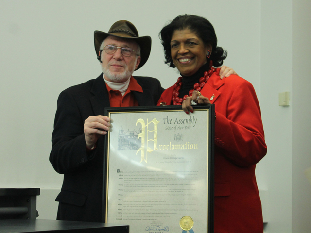 <p>Pamela-Palanque North is honored with a proclamation from Assemblyman Denny Farrell, delivered by assistant Frank Hess.</p>
