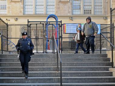 An 8-year-old girl escaped a would-be kidnapper who tried to grab her at the steps of P.S. 33 in The Bronx, officials said.