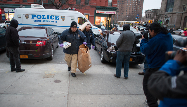 <p>The NYPD brought evidence to the 40th Precinct stationhouse Feb. 26, 2013.</p>
