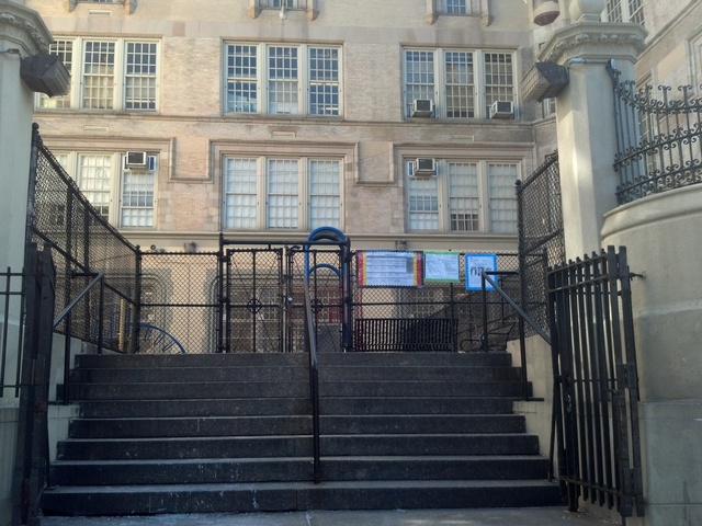 <p>The entrance to P.S. 33 in The Bronx, where an 8-year-old girl escaped a would-be kidnapper who tried to grab her at 8 a.m. Feb. 21, 2013.</p>
