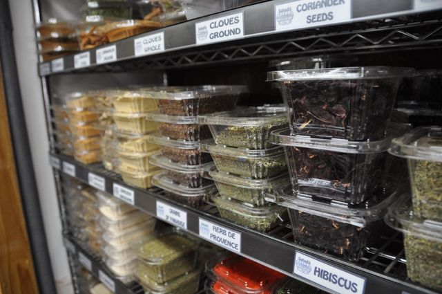 <p>Sahadi's shelves packed with boxes and boxes of herbs and spices.</p>
