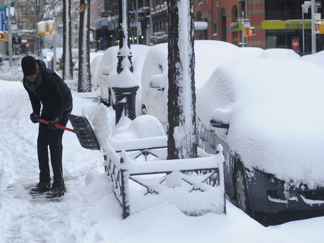 <p>A man shovels in Greenwich Village on Feb. 9, 2013.</p>
