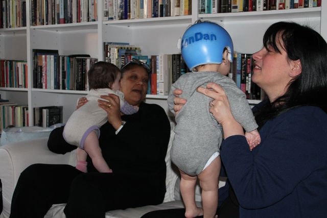 <p>Micol Molinari holds her son Dan, while her nanny Janet holds her daughter Naomi.&nbsp;</p>

