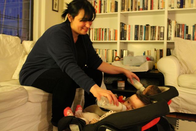 <p>Micol Molinari feeds her youngest twins. She said she never expected to have two sets of twins.&nbsp;</p>
