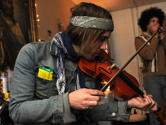 <p>Violinist Chris Anderson practices with the band VietNam in Greenpoint, Brooklyn before they start their national tour, Feb. 26, 2013.</p>
