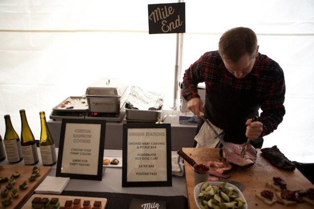 <p>Mile End's table at Wedding Crashers 2012, featuring smoked meat carving and housemade hotdogs.</p>
