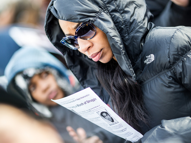 <p>A young woman attends the one-year anniversary of Ramarley Graham - the teenager who was gunned down by an NYPD officer - in the Bronx on Feb. 2, 2013.</p>
