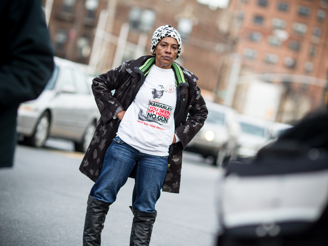 <p>A woman attends the one-year anniversary rally and vigil for Ramarley Graham - the teenager who was gunned down by an NYPD officer - in the Bronx on Feb. 2, 2013.</p>
