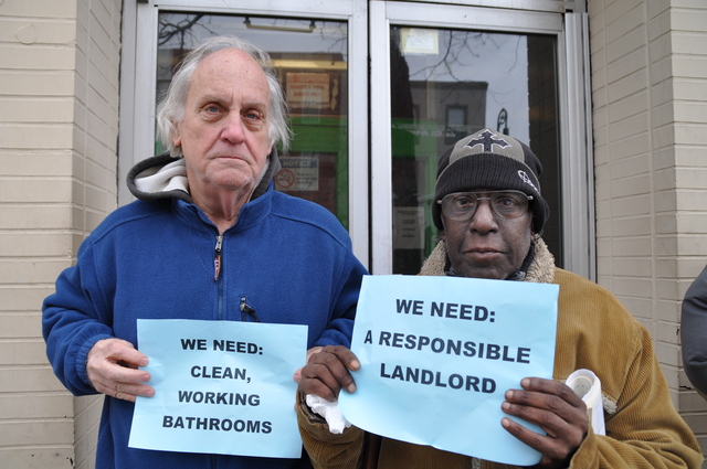 <p>Residents of 1109 Manhattan Avenue stood in front of the building where they said the landlord has denied them basic needs like functional bathrooms and heat.</p>
