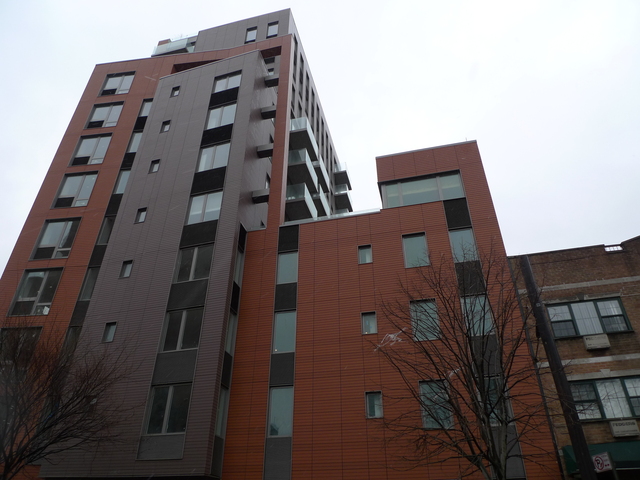<p>The 12-story luxury rental building 202 Eighth St. boasts "oversized" balconies on some units, according to the building's website.</p>
