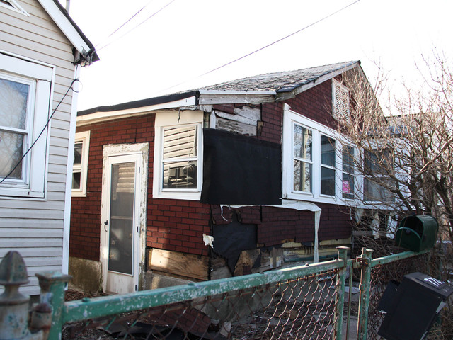 <p>Residents have complained to the city about the homes at 774 and 776 New Dorp Lane. The properties were slapped with a $500 fine in October, but it has not been paid. Residents fear the structures could topple in the next big storm, March 5, 2013.</p>
