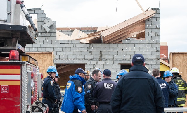 <p>Rescue workers at the scene of a building collapse on East 95th Street in Canarsie on March 22, 2013.</p>
