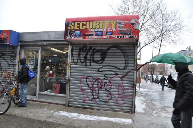 The address of 879 Broadway, currently shared by a security shop, a tarot reader and a few other stores, was the site of an illegal gambling den, court papers allege..DN