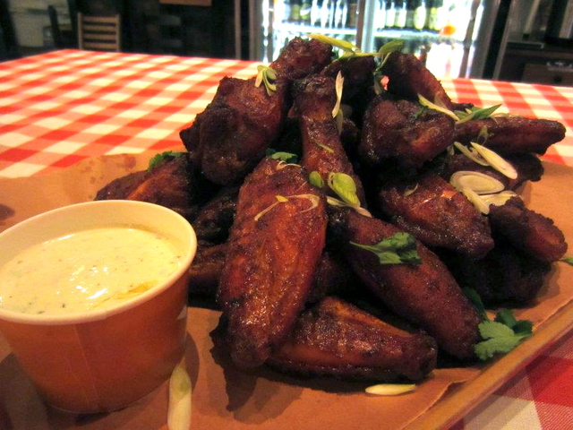<p>Wings at Hill Country Barbecue.</p>
