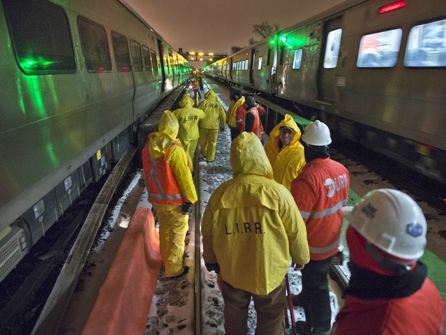 <p>The MTA deployed crews to repair track and right a train that had ridden off the rails on Monday March 18, 2013.</p>
