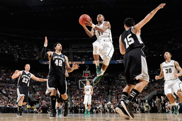 <p>Keith Appling #11 of the Michigan State Spartans shoots the ball against the LIU Brooklyn Blackbirds during the second round of the NCAA Basketball Tournament on March 16, 2012 at Nationwide Arena in Columbus, Ohio.</p>
