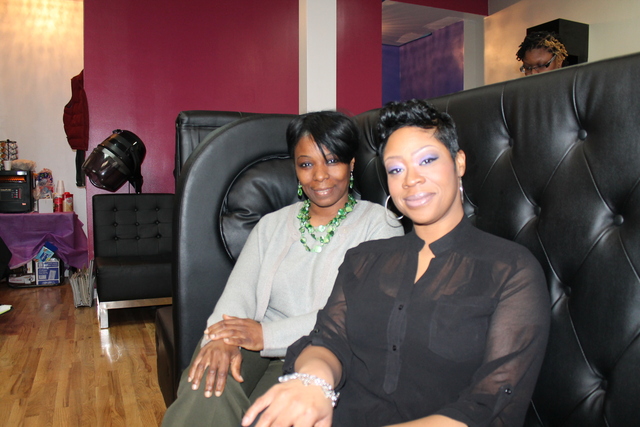 <p>Stephanie McGraw founder of W.A.R.M. (left) has partnered with Elita Spence-Bowles, owner of Elite Conception Hair Lounge to bring women facing domestic abuse to the shop on West 144th Street between Frederick Douglass Boulevard and Adam Clayton Powell Jr. Boulevard for a day of treatment.</p>
