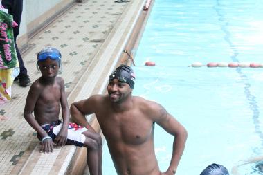 With statistics showing that 70 percent of African-Americans don't know how to swim and that parent fear is the major factor, Olympic Gold medalist Cullen Jones is out to change the odds through Make A Splash, an anti-drowning initiative with the USA Swimming Foundation that kicked off its fifth national tour with a stop in Harlem Friday at P.S. 152 Ralph Bunche Elementary.