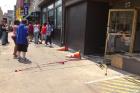 Van Backs Into Woman on LES Sidewalk, Crashes Through Storefront