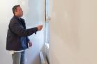 Congressman Joins Students to Help Paint Sandy-Damaged Homes