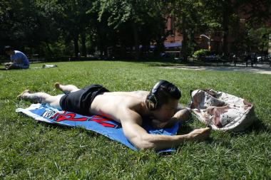 The heatwave continued to strike New York Tuesday, as temperatures were expected to rise to 96 degrees.