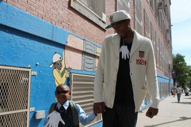  "I went to public school and I'm glad my son is going," said Lamar Mitchell, 33, as he brought his son Lynden, 4, home from his first day of Pre-K at P.S. 76 A. Phillip Randolph. 
