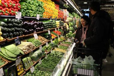 The neighborhood where tire shops and auto repair dominated is now a gourmet food shopping destination.