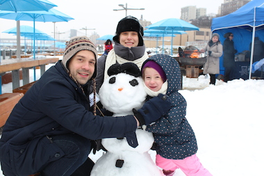 Dozens of families braved the flurries and wind to join in the snow sculpture competition at Pier 5 in Brooklyn Heights on Saturday.